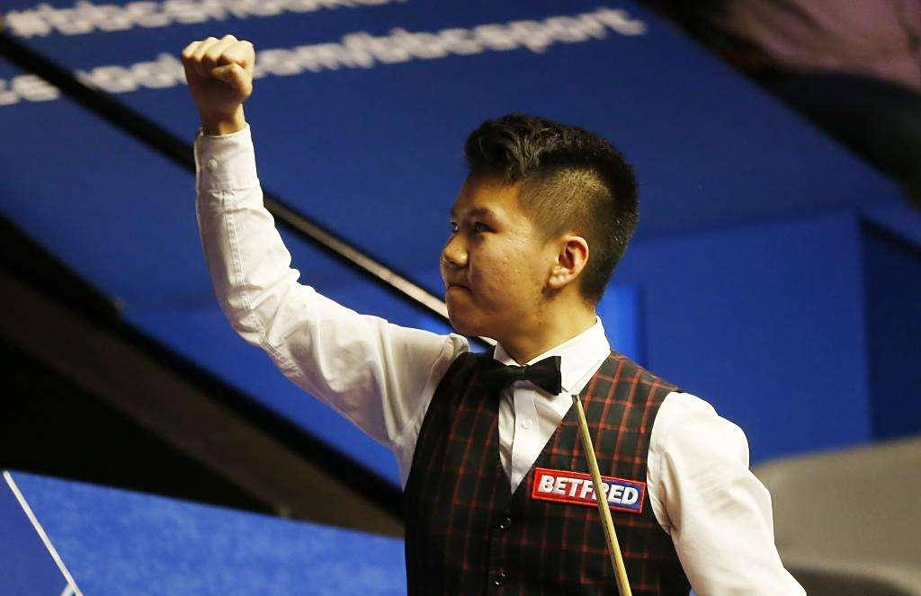 万英镑, 英格兰公开, 肖国栋作为